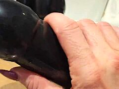 Watch this redhead slut orgasm from huge anal sextoy fucking!