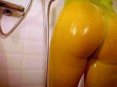 Pornstar teases with wet, clinging clothes