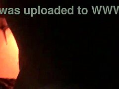 sexy tattooed curvy woman with piercings moaning softly in a relaxed setting