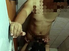 asian couple enjoys intimate moment in bathroom