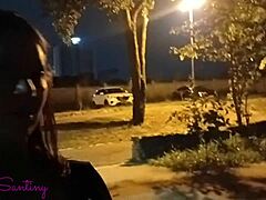 Big ass babe jerks huge black cock in public square