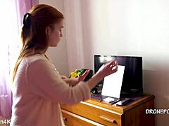 Beautiful naked redhead karolinka applies makeup while posing