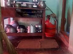 Indian sexy aunty cleans plates while teasing in the dorm