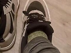 Detailed Scene of Friend Trashing Sneakers and Shoes with Feet Involved.