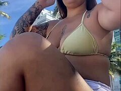 Exhibiting my big pussy on the beach