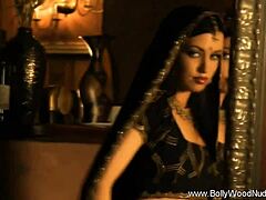 bolly babe dances seductively, stripping off clothes to reveal her gorgeous brunette curves in an exotic tease