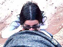 She gives a deep blowjob with glasses on in a beautiful outdoor canyon setting free