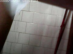 Hidden camera captures a steamy voyeur view of my aunt's private bath moment in full detail