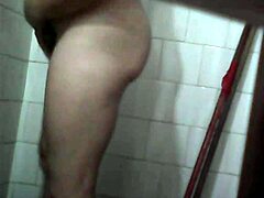 Hidden camera captures a steamy voyeur view of my aunt's private bath moment in full detail