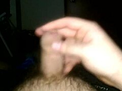 subtle hints of an uncut cock in solo masturbation with cum release