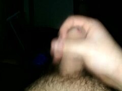 subtle hints of an uncut cock in solo masturbation with cum release