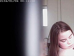 Blonde with big boobs caught changing in a voyeur moment