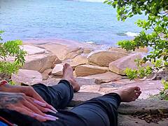 horny african amateur masturbates with handjob to surprise cum orgasm outdoors on public beach