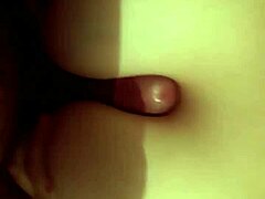 oh man the slut of my wife is doing a titjob with her big tits i mean it's so hot she squeezes them around me