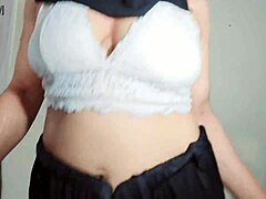 Hey, watch this Arabic slut in black hijab dancing erotically at home, shaking her small tits and curvy ass to music.