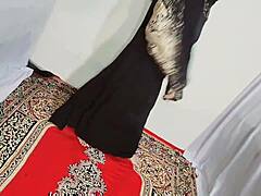 Hey, watch this Arabic slut in black hijab dancing erotically at home, shaking her small tits and curvy ass to music.