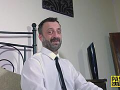 In a hardcore BDSM session, the busty submissive gets her pussy banged deeply by the dominant while bound in stockings.