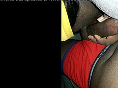 she's giving this ebony dude a sloppy deepthroat blowjob