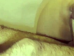 Arab woman expresses passion during intimate bedroom encounter