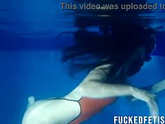 Helen Star models sexy swimwear during night apnea session in the pool