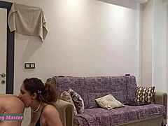 She casually straps on and slides that dildo deep into his tight ass during their steamy bath session. He moans as she dominates him fully.