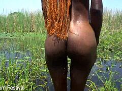 Imagine a slim African woman with soft butt and skinny frame bathing peacefully in the river
