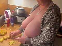 look at these two big natural tits in the kitchen while i give a handjob says german milf
