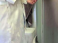 stepmom caught her son in the shower and decided to help him jerk off until he came on her tits