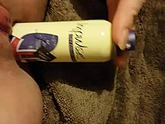 Fucking my young 18+ slutty pussy with a deodorant can while stretching and gaping that shaved hairless cunt