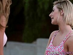 Petite lesbian boldly rubbing pussy in intense close-up action with wet details and moans