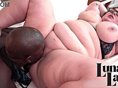 Watch sexy BBW Luna Lark wrap her huge tits and wet mouth around Bonez Montana's massive cock for ultimate pleasure!
