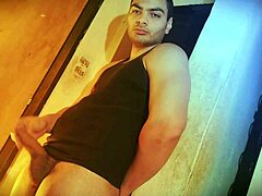 struggling to lift this sexy muscular bodybuilder's huge cock against the wall