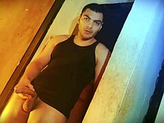 struggling to lift this sexy muscular bodybuilder's huge cock against the wall