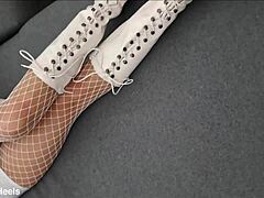 That perfect ass milf struts in high-heeled boots and fishnet stockings but what's underneath?