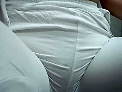 Close-Up View of Woman Urinating from Spread Pussy Lips in Detail