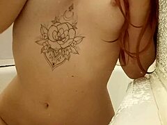 what hides beneath redhead teen's tattooed bath skin?