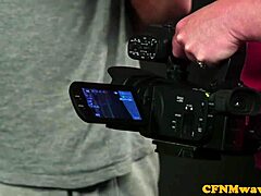 the gorgeous cfnm domina grabs his cock and sucks hungrily while others watch humiliated