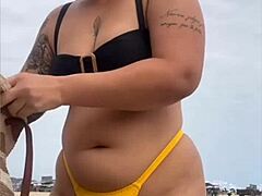 wanna see this yellow bikini splitting my swollen black pussy on the beach?