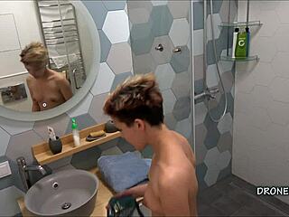 What’s Alex hiding in the shower voyeur clip?